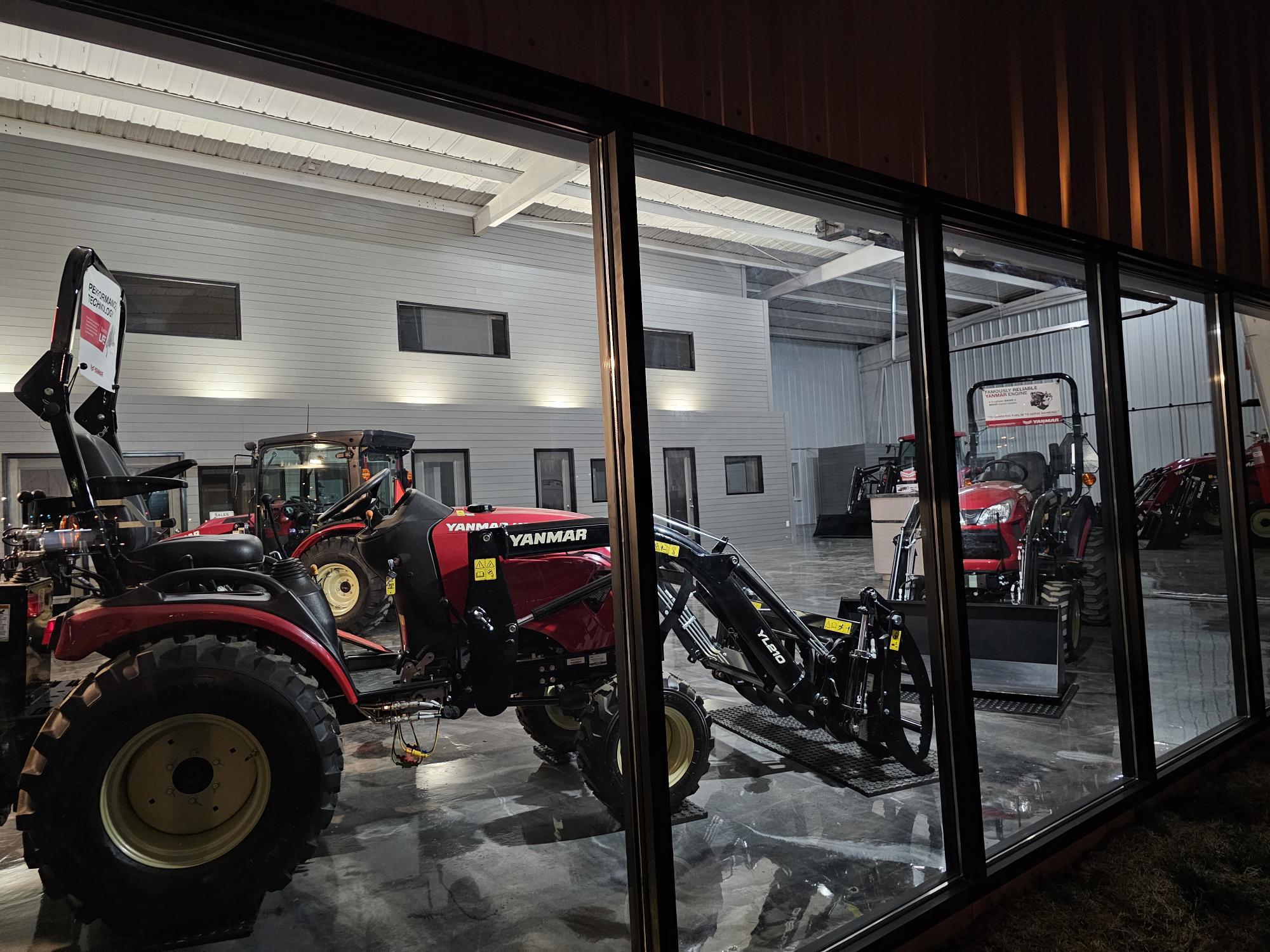 Yanmar equipment displayed behind windows